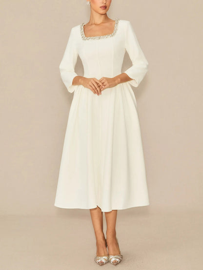 Elegant Crystal Embellished Midi Dress