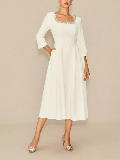 Elegant Crystal Embellished Midi Dress